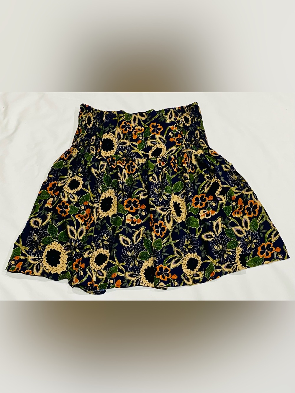 NATURAL LIFE Navy Floral Smocked Mini Skirt with Green and Orange Accents Sz. M